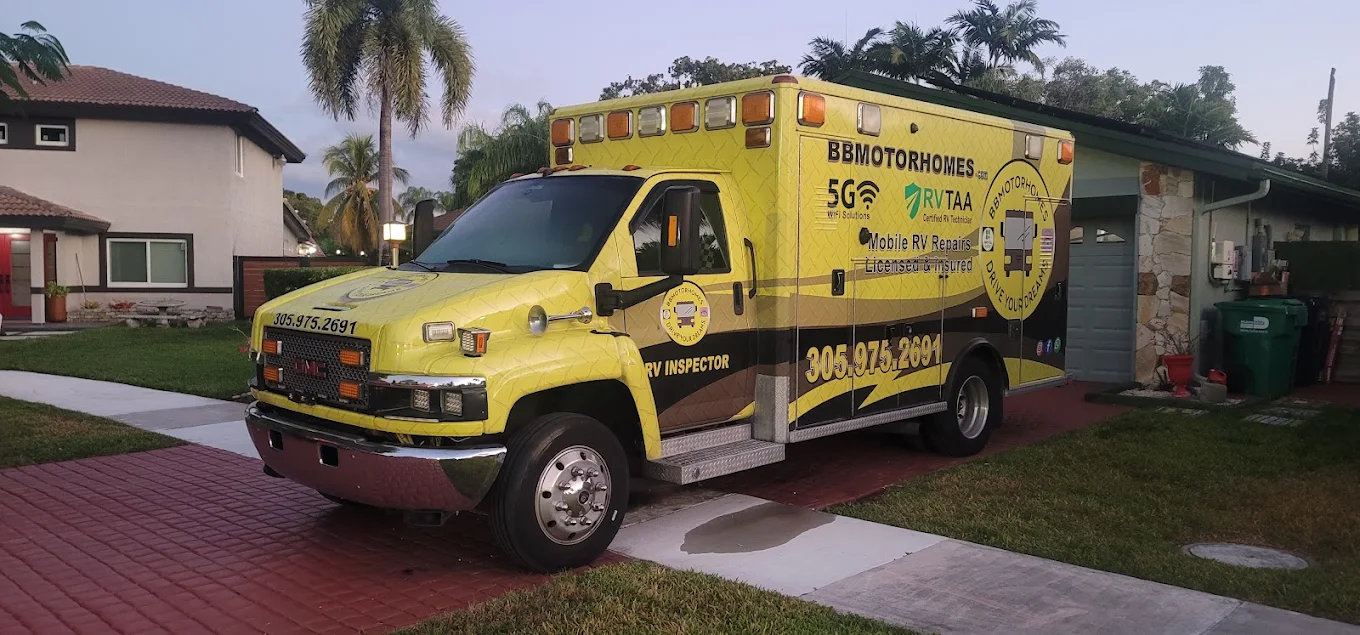 BB Motorhomes GMC mobile RV service vehicle parked in a Miami driveway at dusk